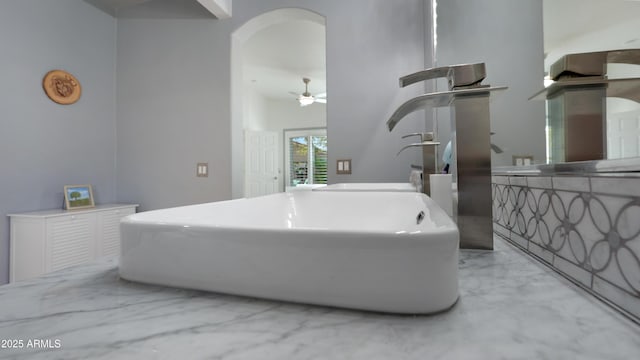 4073 E Stable Ct, Gilbert, AZ 85297 - bathroom featuring a freestanding tub, marble finish flooring, and ceiling fan