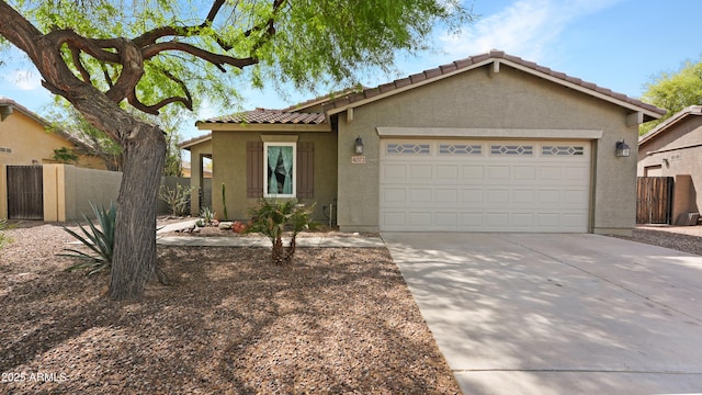 4073 E Stable Ct, Gilbert, AZ 85297 - view of front of property featuring stucco siding, concrete driveway, an attached garage, and a tile roof