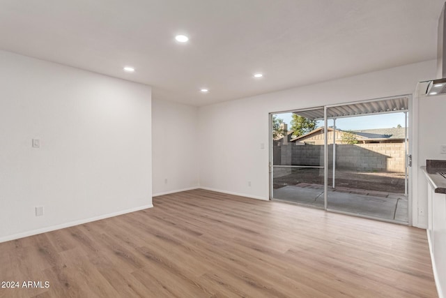 empty room featuring light hardwood / wood-style floors