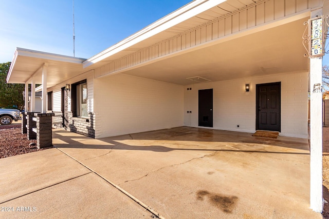 view of patio / terrace featuring a carport