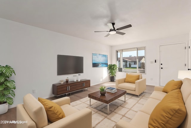 living room with ceiling fan and light hardwood / wood-style flooring