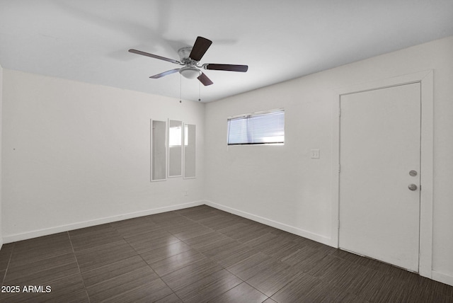 unfurnished room with ceiling fan