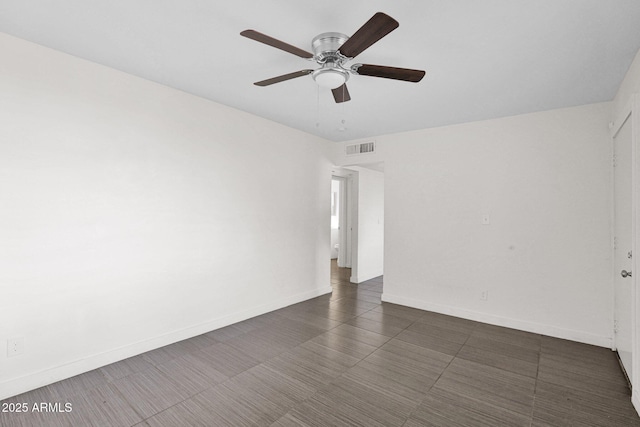 empty room featuring ceiling fan