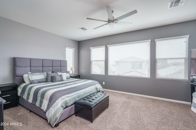 bedroom featuring ceiling fan and carpet floors