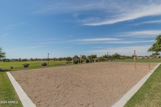 view of home's community featuring a lawn