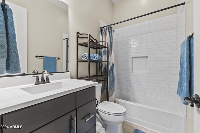 full bathroom with tile patterned floors, shower / tub combo with curtain, vanity, and toilet