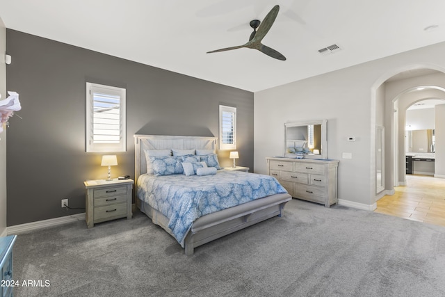 bedroom with ceiling fan and carpet floors