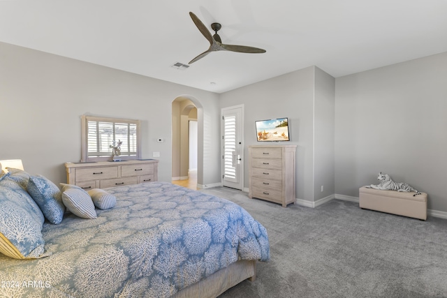 carpeted bedroom with ceiling fan