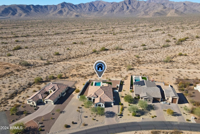 drone / aerial view featuring a mountain view