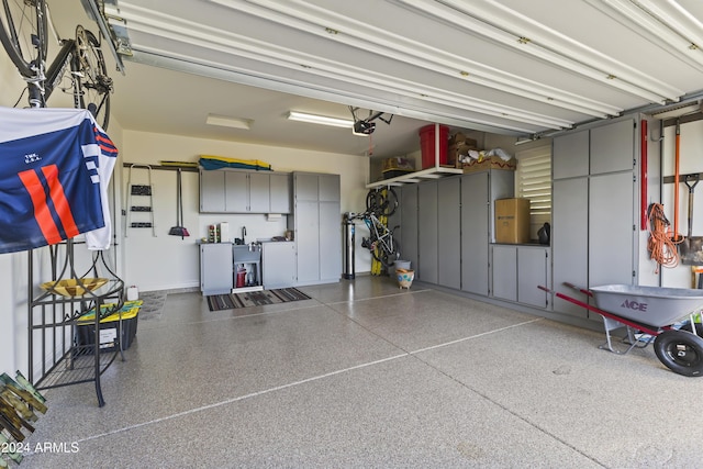 garage featuring a garage door opener