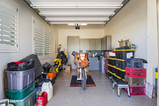 garage featuring a garage door opener