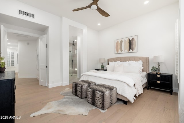 bedroom with light wood finished floors, recessed lighting, baseboards, connected bathroom, and a ceiling fan