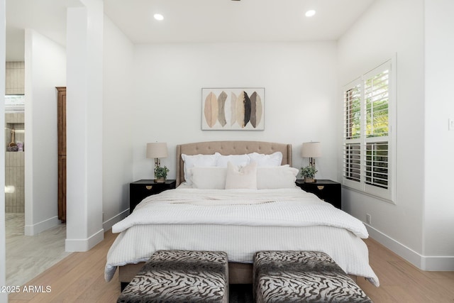 bedroom featuring light wood-style floors, baseboards, and recessed lighting