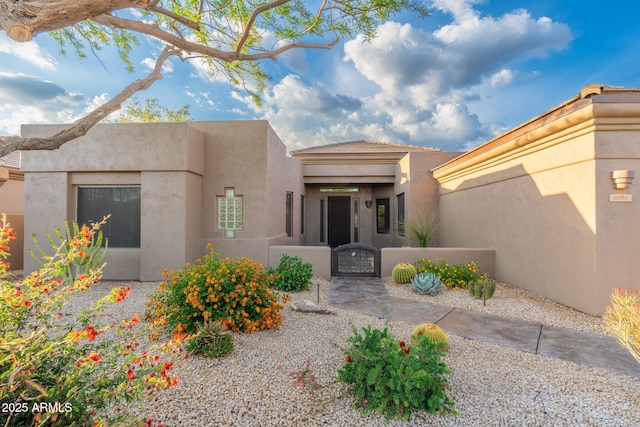 view of front of house with stucco siding