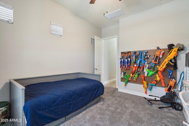 carpeted bedroom with ceiling fan