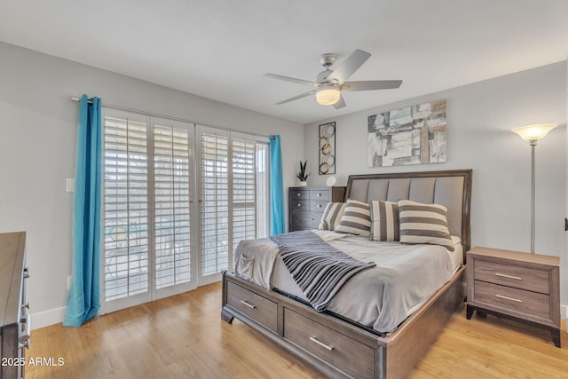 bedroom with ceiling fan, access to exterior, and light hardwood / wood-style flooring