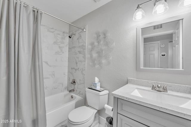 full bathroom featuring vanity, toilet, and shower / tub combo