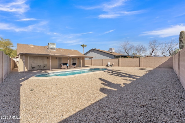 exterior space featuring central AC unit and a patio