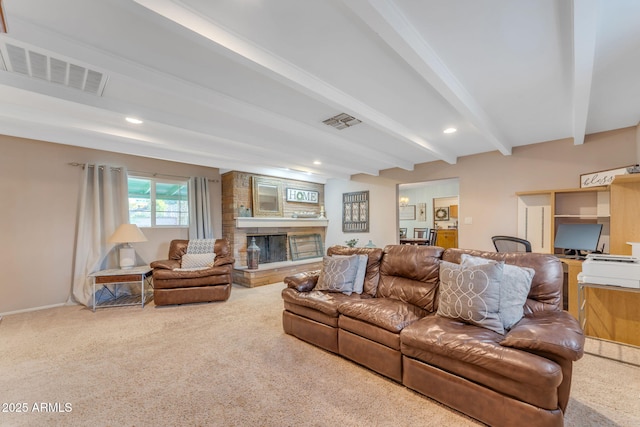 carpeted living area with recessed lighting, a large fireplace, visible vents, and beam ceiling