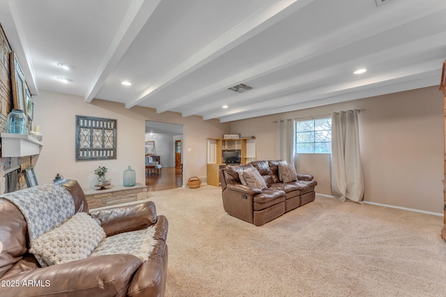 carpeted living area featuring a fireplace, recessed lighting, visible vents, beamed ceiling, and baseboards