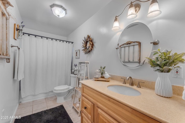 full bathroom featuring vanity, toilet, and tile patterned floors