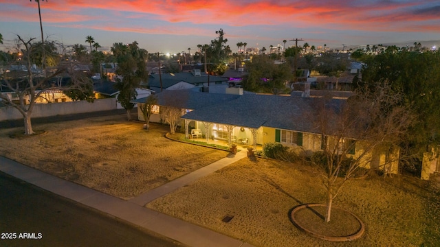 view of front of property with fence