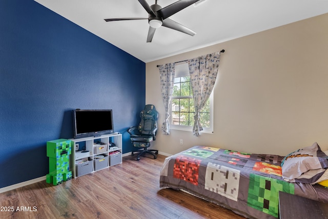 125 S 56th St Unit 27, Mesa, AZ 85206 - bedroom featuring wood finished floors and ceiling fan