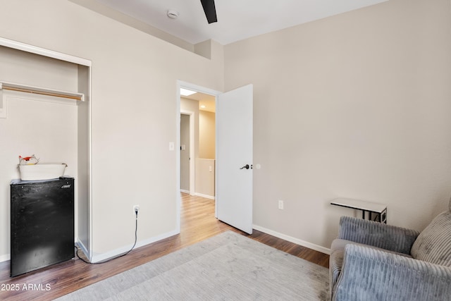 125 S 56th St Unit 27, Mesa, AZ 85206 - living area featuring wood finished floors and ceiling fan
