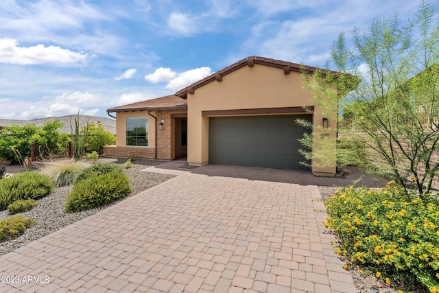 view of front of home featuring a garage