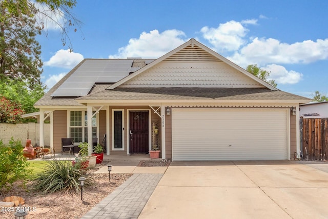 2508 N Karen Dr, Chandler, AZ 85224 - view of front of house with roof with shingles, solar panels, concrete driveway, covered porch, and an attached garage