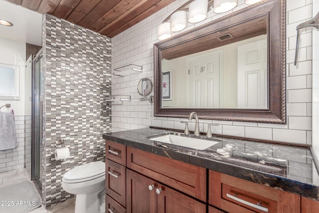 2508 N Karen Dr, Chandler, AZ 85224 - full bath featuring tile walls, vanity, toilet, a stall shower, and tasteful backsplash