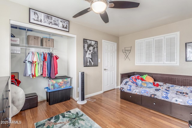 2508 N Karen Dr, Chandler, AZ 85224 - bedroom with wood finished floors, a closet, ceiling fan, and baseboards