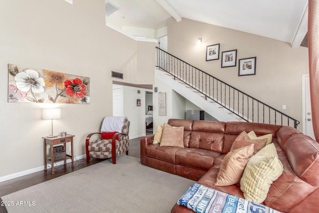 2508 N Karen Dr, Chandler, AZ 85224 - living area with high vaulted ceiling, stairway, wood finished floors, beamed ceiling, and baseboards