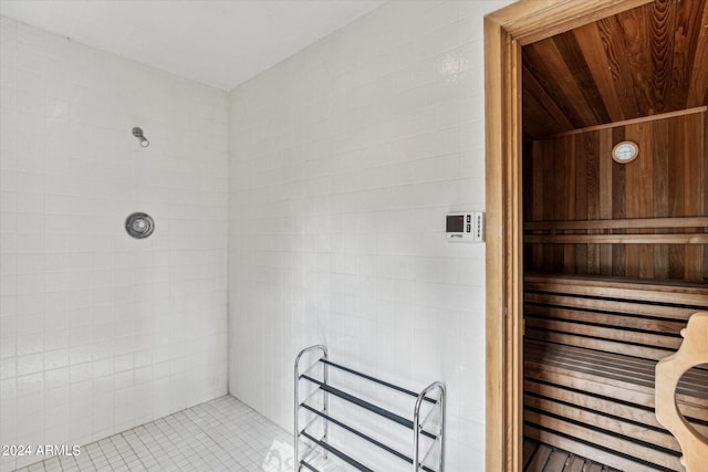 interior space featuring wood ceiling and tile flooring