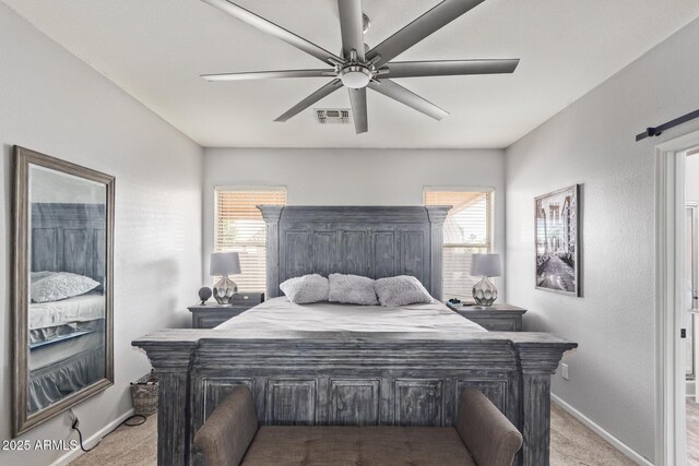bedroom with multiple windows, visible vents, baseboards, and light carpet