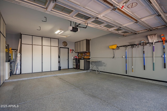 garage featuring a garage door opener