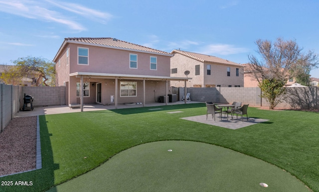 back of house with central AC unit, a patio area, a fenced backyard, and stucco siding