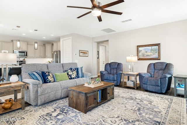 living room featuring ceiling fan