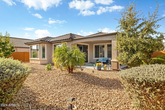 back of house featuring a patio