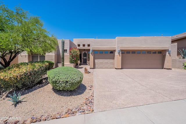 14806 E Lookout Ledge, Fountain Hills, AZ 85268 - southwest-style home featuring an attached garage, stucco siding, and driveway