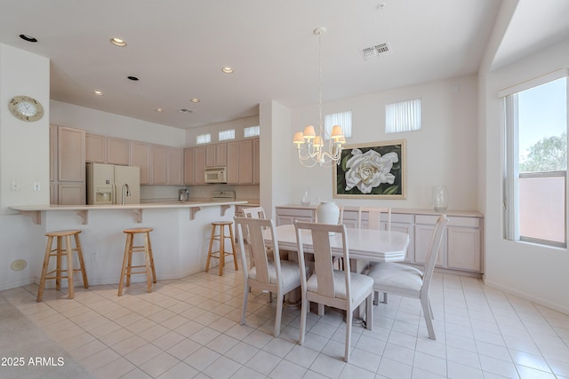 14806 E Lookout Ledge, Fountain Hills, AZ 85268 - dining area featuring a chandelier, light tile patterned floors, recessed lighting, and baseboards