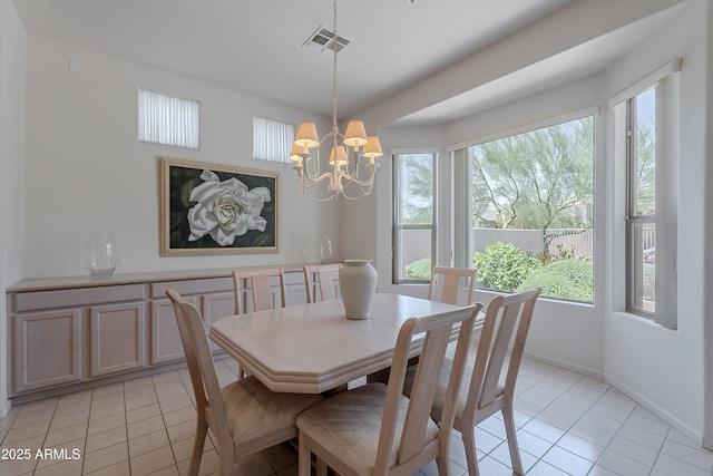 14806 E Lookout Ledge, Fountain Hills, AZ 85268 - dining room featuring light tile patterned flooring, a chandelier, and baseboards