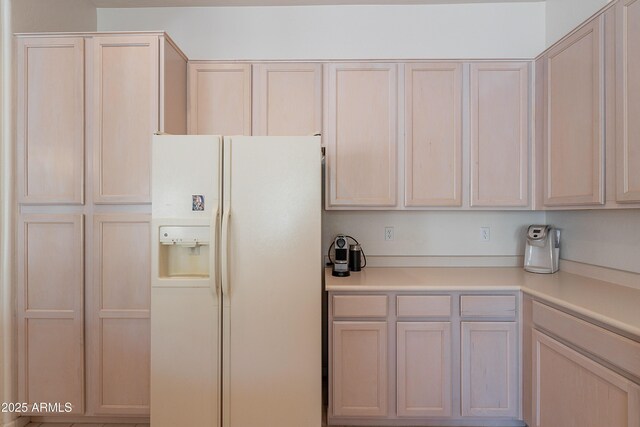 14806 E Lookout Ledge, Fountain Hills, AZ 85268 - kitchen featuring white fridge with ice dispenser, light countertops, and light brown cabinetry