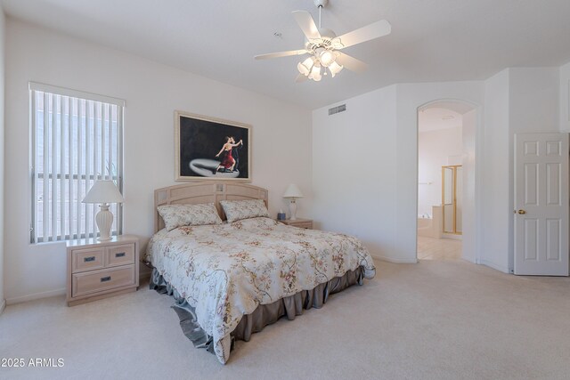 14806 E Lookout Ledge, Fountain Hills, AZ 85268 - bedroom with carpet flooring, baseboards, arched walkways, and ensuite bath