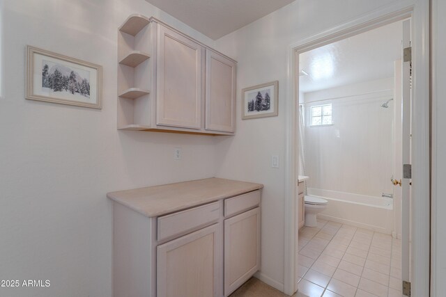 14806 E Lookout Ledge, Fountain Hills, AZ 85268 - bathroom with toilet, tile patterned floors, and washtub / shower combination