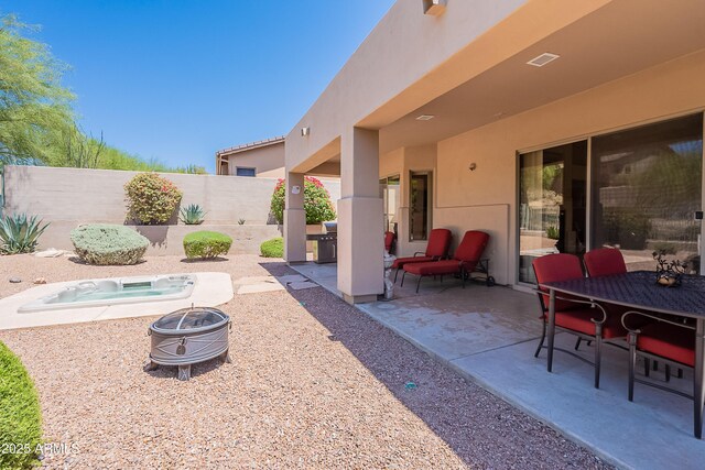14806 E Lookout Ledge, Fountain Hills, AZ 85268 - view of patio featuring fence, a fire pit, area for grilling, and outdoor dining space