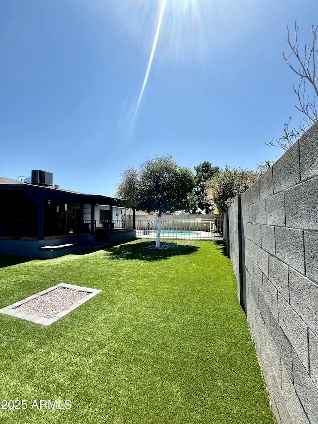 view of yard with fence