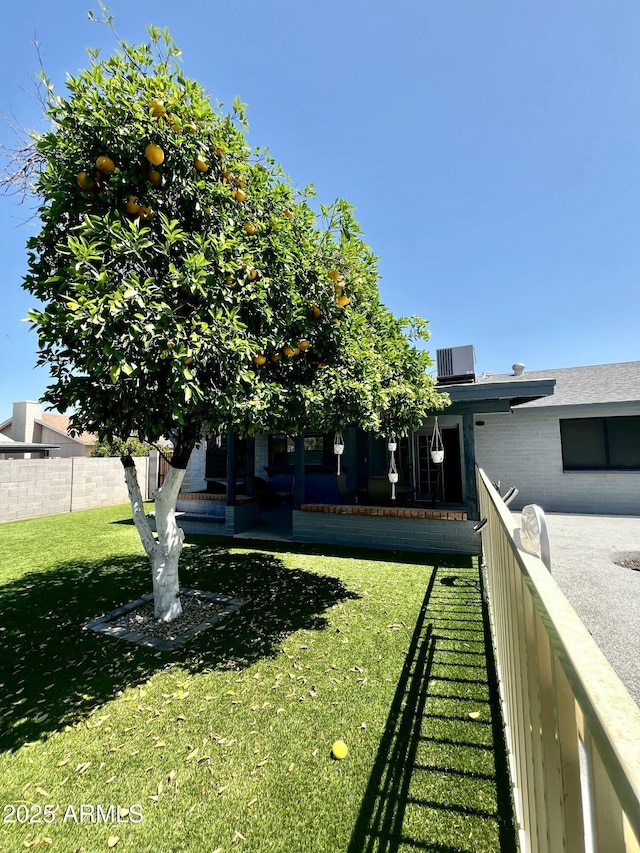 view of yard featuring fence