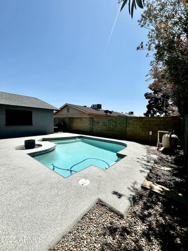 view of pool featuring a fenced in pool, a patio area, and a fenced backyard