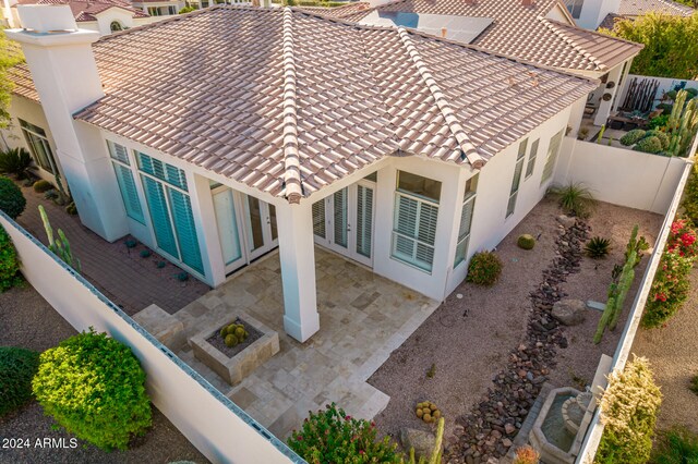 back of house with a patio area